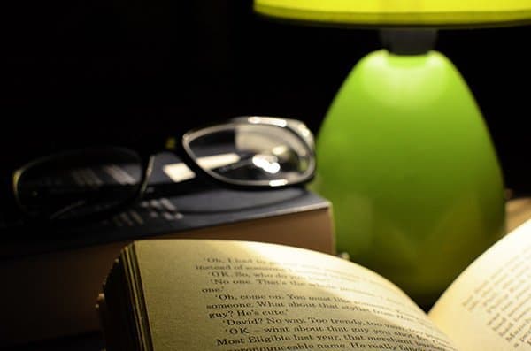 A book on a bedside table