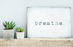 calm sign saying 'breathe'