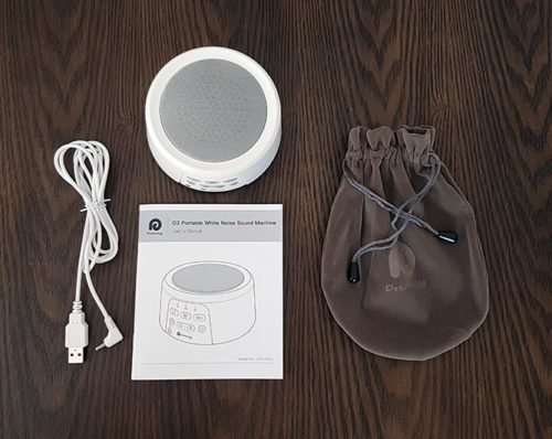 photo of the dreamegg sound machine with the carry bag, instructions and power cable