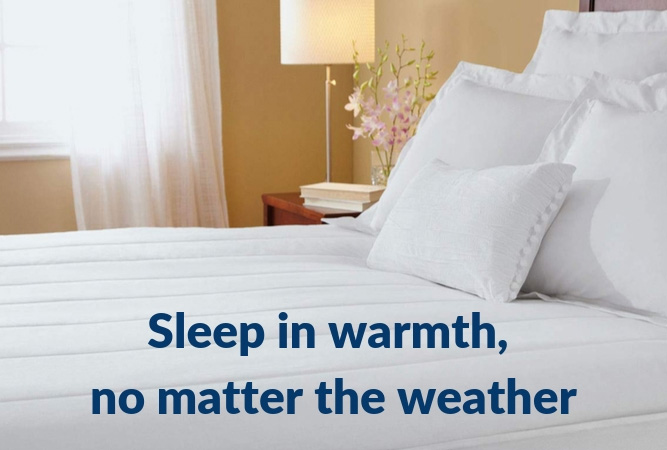 image of a bed with a heated mattress pad, with the words 'sleep in warmth, no matter the weather'